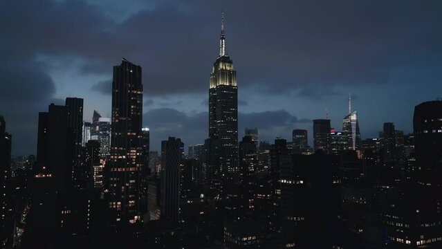 alt evening flying left view of midtown NYC skyline