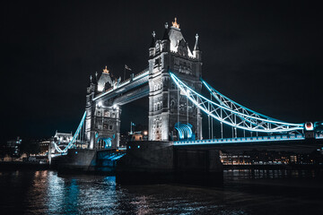 Fototapeta na wymiar Tower Bridge at night with reflection of the lights
