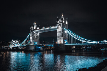 Tower Bridge at night with the reflection of the light