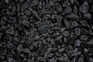 Natural black coals for background. Industrial coals. Volcanic rock backdrop design.