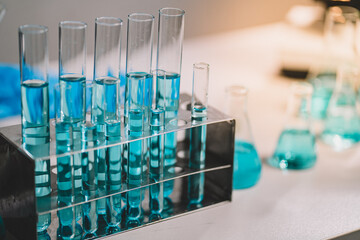 In laboratory contains tube, beaker, liquid, virus and samples. Liquid substance in equipment glassware for chemistry biology. development for analysis scientific. healthcare and medical concept.