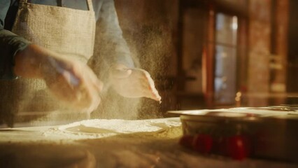 In Restaurant Professional Chef Preparing Pizza, Kneading Dough, Spinning, Tossing it, Traditional Family Recipe. Authentic Pizzeria, Cooking Delicious Food. Slow Motion Cinematic Low Angle Shot