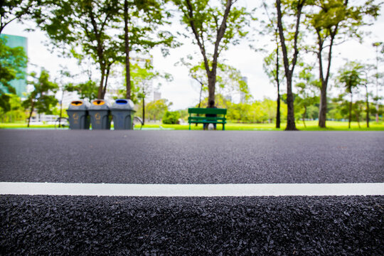 abstract Asphalt road surface with white line Road for walking excercise or jogging. picture for add text message or design art work. Healthy Fitness Concept backdrop.
