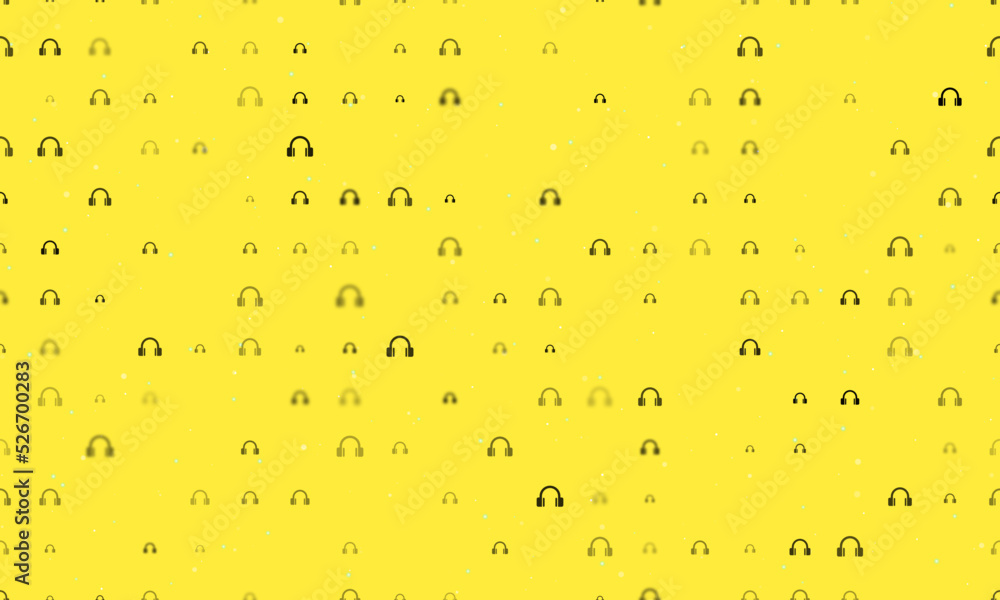 Poster seamless background pattern of evenly spaced black headphones symbols of different sizes and opacity