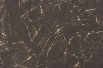 texture of forged copper sheet covered with patina close-up