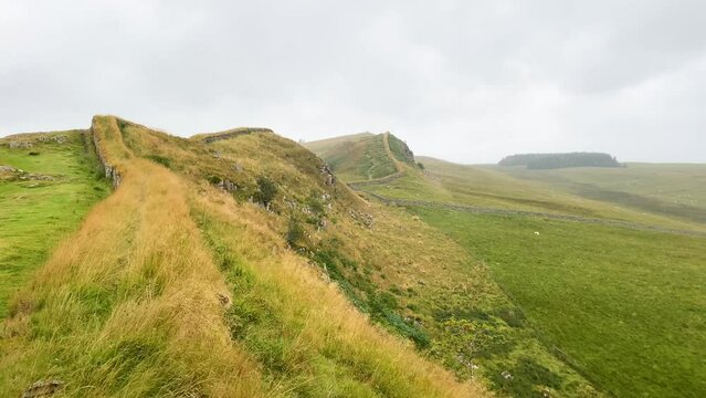 Incredible dramatic landscape shot of Hadrians Wall in North England