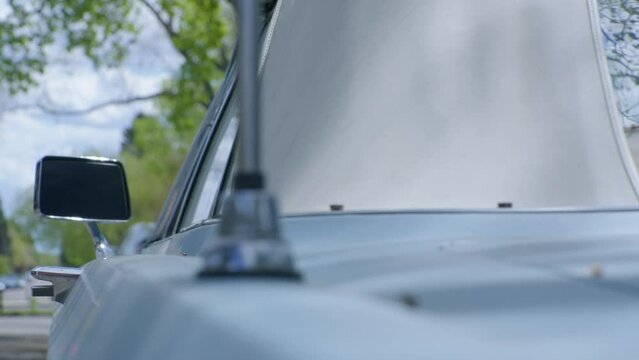 Vintage car blue Mercury side view mirror