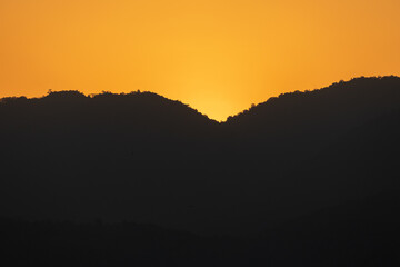 Landscape of the sunset mountains of Lore Lindu national park, near Bomba, South Lore, Poso Regency, Central Celebes, Indonesia