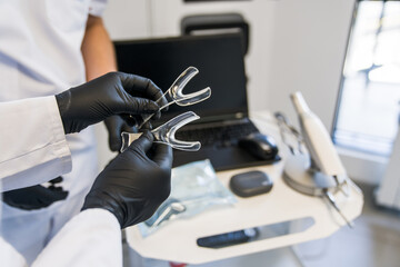 Dentist holding whitening tray at the hands while preparing to the procedure