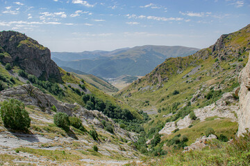 mountain landscape with blue sky and clouds