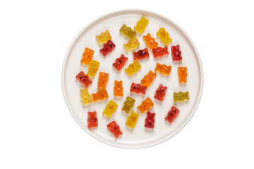 jelly candy. Fruit jelly bears in different flavors and colors. sweets are on the plate isolated on white. top view. copy space