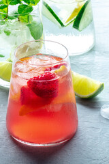 Summer cocktail. Cold drinks with fresh fruit. Healthy mocktail. Citrus and strawberry lemonades with ice