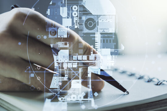 Double exposure of creative artificial Intelligence symbol with man hand writing in notebook on background. Neural networks and machine learning concept