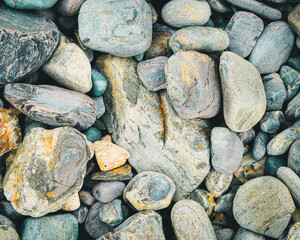 Multi coloured beach rocks