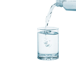 Pouring water into glass isolated on white background. Healthy drink concept.
