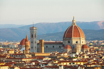 Fototapeta na wymiar Cathedral of Santa Maria del Fiore and Giotto's Bell Tower at dawn. Florence, Italy. Panorama of the city