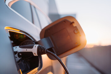 Charging an electric car, future transportation concept
