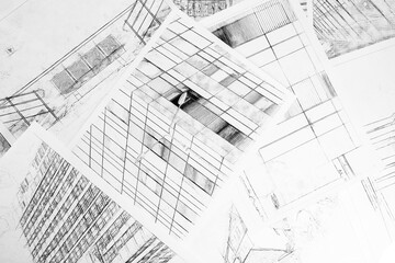 Background with architectural drawings. Sheets with sketches of buildings.