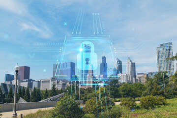 Fototapeta premium Chicago skyline from Butler Field towards financial district skyscrapers, day time, Chicago, Illinois, USA. Parks gardens. The concept of cyber security to protect companies confidential information