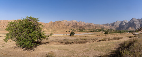 Rural mountain landscape panorama in Mazar-i-Sharif countryside near Penjikent or Panjakent, Sughd region, Tajikistan