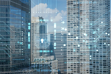 Obraz premium Aerial panoramic city view of Chicago downtown area, day time, Illinois, USA. Birds eye view, skyscrapers, skyline. Concept of cyber security to protect companies confidential information, hologram