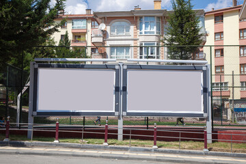 two blank billboard on the street
