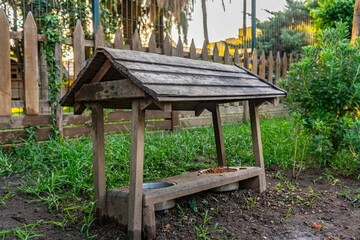 wooden cat house in the garden