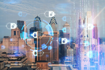 Aerial panoramic cityscape of Philadelphia financial downtown, Pennsylvania, USA. City Hall Clock Tower at sunrise. Decentralized economy. Blockchain, cryptocurrency and cryptography concept, hologram