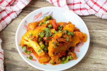 Indian Mix Veg or Mixed Vegetable recipe served in a small plate