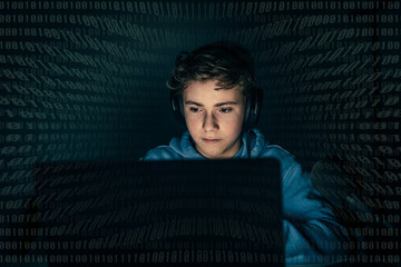 Teenager focused on computer display. Green numbers on background. Login with credentials user and password. Technology communication, security protection intrusion, hacker attack, cyber crime concept