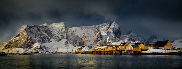 Sunrise over Sakrisoy, reinefjord and moutains lofoten Norway