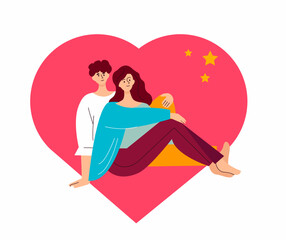 A couple in love on the background of the heart looks at the stars.