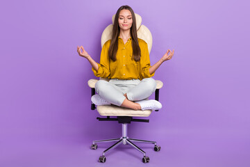 Full size portrait of positive calm person sit leather chair meditate retreat isolated on purple...