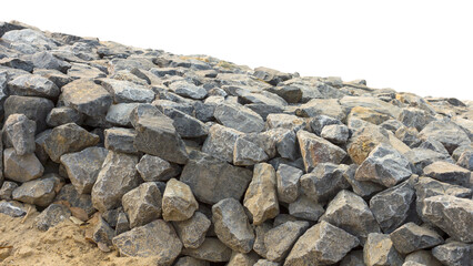 Isolates background pile stones, which packed a stack to barrage the sand on the beach.