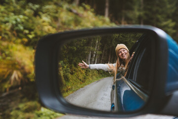 Autumn road trip woman traveling by rental car adventure lifestyle vacations vibes outdoor in...