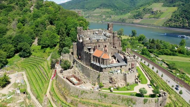 Reichenstein Castle with Clemenskapelle, Trechtingshausen on the Rhine river. Middle Rhine Valley, Rhineland-Palatinate, Germany, Europe. Reichenstein castle in the valley of medieval castles.