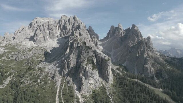 Mountain Crest Aerial Drone with Clouds Video. 4K Mountain Peak Aerial Footage in the Dolomites Italy D-Cinelike Log format