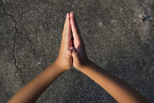 
Two Hands Of A Child Facing Each Other