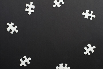 Close-up of blank white jigsaw puzzle texture background