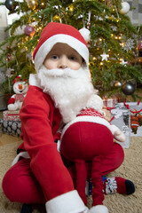 European boy in a Santa suit, Christmas, New Year