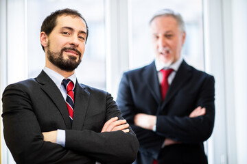 Two businessmen in an office