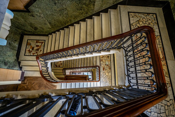 Looking down the stairs in a historical building