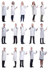 Fototapeta na wymiar group of doctors with clipboard isolated on white