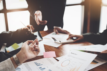 businesspeople working with partners is adjusting marketing strategies