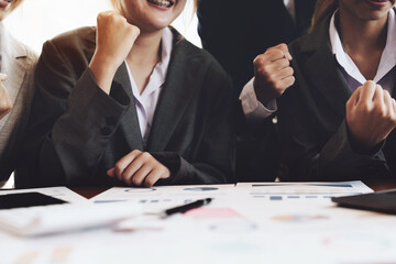 Businesspeople showing success with sales