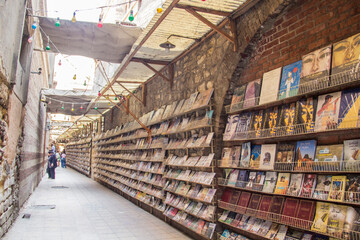 Beautiful historical street with book trade in Coptic Cairo, Egypt