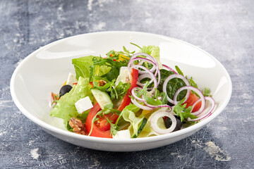 greek salad on the white plate