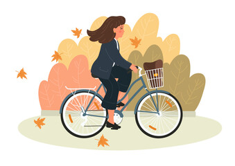 Autumn. Businesswoman on bicycle with basket. Woman in formal clothes cycling to work in the fall park.