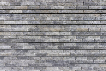 Natural stone color brick wall textured background	