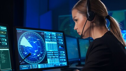 Workplace of the air traffic controllers in the control tower. Team of professional aircraft...